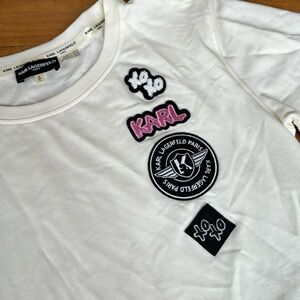 White Karl Lagerfeld Sweater with Embroidered Patches.